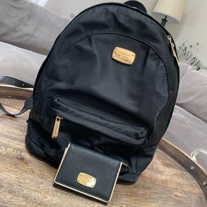 Michael Kors backpack and matching wallet